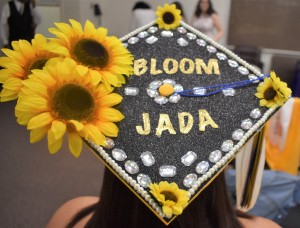 Jada Jones’ mortarboard blooms bright to stand out in a crowd during graduation.