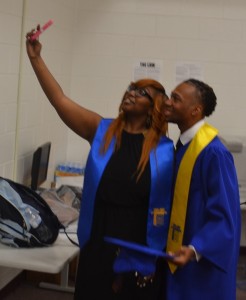 The selfie craze is in full effect for graduates as Da'Vondria Jefferson and Shawn Burks Jr. capture the moment.