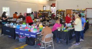 Vendors of arts and crafts, as well as a number of other items take place on the floor of the bay at Quinton Volunteer’s Open House.