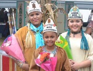 Representing the Chickahominy Tribe for a second consecutive year are (front) Little Miss Chickahominy Kristiana Delaney, (back, l to r) Miss Chickahominy Vanessa Adkins, and Junior Miss Chickahominy Brooke Adams.