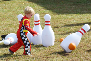 Pumpkin-themed games dominated the grounds such as pumpkin bowling (below) and pumpkin ring toss (bottom).