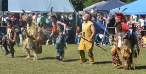 Members of the Chickahominy Tribe step in rhythm as part of the traditional welcome dance.