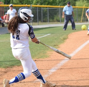 The ball explodes off the bat of McKenna Mueller on its way to clearing the left field wall for a home run.