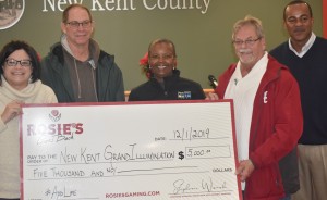 Rosie’s Gaming Emporium General Manager Stephanie Wisneski (left) presents a $5,000 check to New Kent County supervisors (l to r) Tommy Tiller, Patricia Paige, Ron Stiers, and New Kent County Administrator Rodney Hathaway to assist with the event.