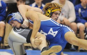 New Kent’s James Giffin works to turn his Lafayette opponent just before securing a pin.