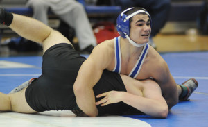 New Kent’s David Taylor dominates his Jamestown opponent, later gaining a pin.