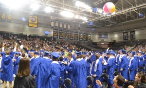 Caps and inflatables propel upwards after the Class of 2017 is officially announced as graduates.