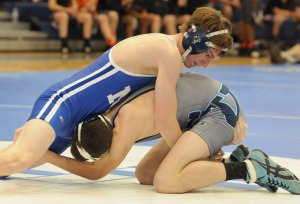 New Kent’s Ian Edwards battles Spring Valley’s Alex Ware but lost by pin.