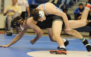 Blake Hohman takes Poquoson’s Alec Bleeker to the mat on the way to a pin.