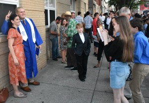 Gavin Stevens (left) takes time to have a little fun during a family picture to celebrate his big day.