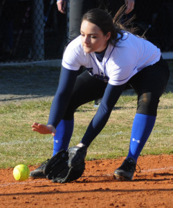  Lady Trojan third baseman Madison Beasley fields a third inning grounder.