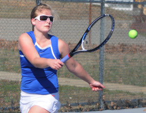 Britta VanderPoorte runs down a shot by her Mathews opponent in number 2 singles.