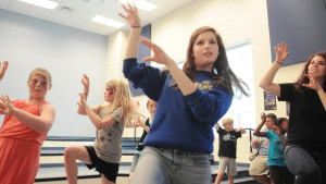 Back in the high school's drama room, kids (above and below) rehearse their dance moves for their adaptation of Michael Jackson's "Thriller."