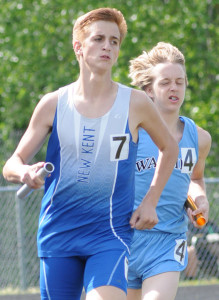 Jon Swartout passes a Warhill runner during the final leg of the 4x800 relay anchoring the New Kent team's second place finish.