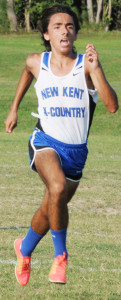 New Kent’s Andrew Carlin finishes strong to lead the Trojans and place third overall.