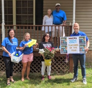 New Kent High School instructor Joe Crump (at top right) received the honor of being named the Teacher of the Year at the upper level.