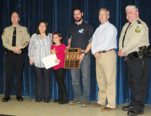 Clara Goins (third from left) is New Kent Elementary School’s recipient of the citizenship award. She is accompanied by (l to r) Howard, mother Christine Goins, father Josiah Goins, Rula, and McLaughlin.