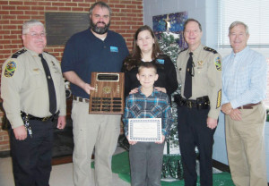Jaxon Oliva (center) is George Watkins Elementary winner of the citizenship award. He is joined by (l to r) McLaughlin, father Dan Ward, mother Miranda Ward, Howard, and Rula.