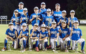 Team members of New Kent’s 9YO squad display their hardware after shutting out Williamsburg 15-0 in the championship game.