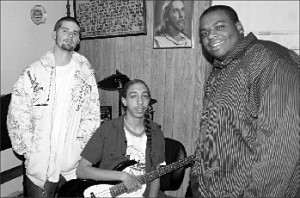 Moss (center), is shown here in a 2009 Chronicle article photo with original members of The New Age Marcus Peck (left) and Romaine Adkins (right).Alan Chamberlain photo