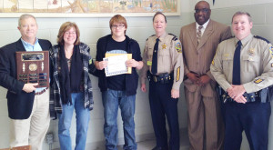 New Kent Middle School recipient Nicholas Parker (center) is joined by (l to r) Rula, mother Alethea Parker, Howard, principal Sammy Fudge, and Heath Jenkins during his acceptance.